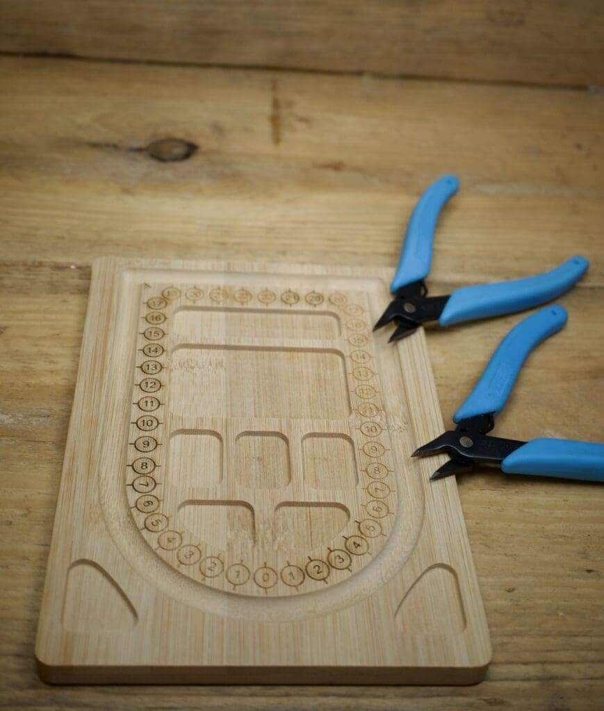 Jewellery making tools and beading board